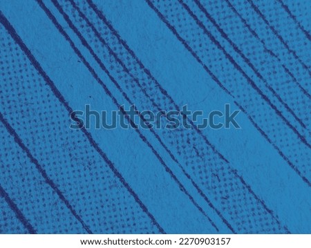 Macro view of the dot printing pattern on an old comic book page with an abstract blue monotone color effect