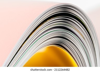 Macro view, edges of opened book as abstract curves
