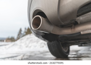 A Macro View Of The Exhaust Pipe Of A Modern Car In Winter