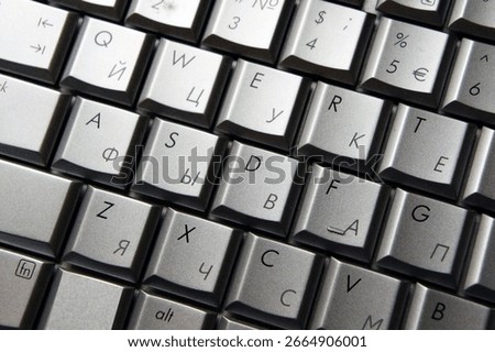 Macro View of Keyboard Featuring Cyrillic and Latin Lettering for Multilingual Input