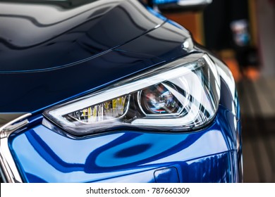 Macro View Of Modern Blue Car Headlight