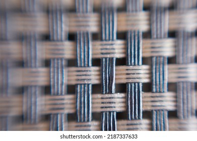 Macro view of plastic canvas. Abstract blur background.