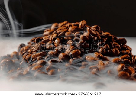Macro view of roasted coffee beans with dense, flowing steam drifting across the frame, highlighting texture and warmth against a dark background with subtle copy space