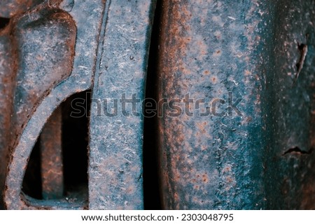 Macro view of rusted iron wheels from old train car