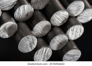 Macro view of stack aluminum rods, metallurgical industry products