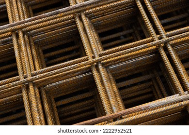macro view of a stack of brown colored electro-welded mesh