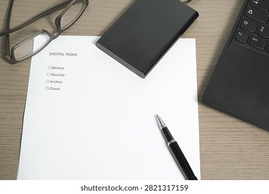 Macro view of a workstation featuring glasses, a 