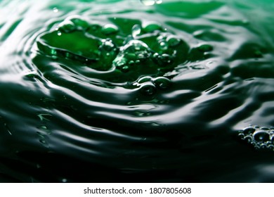Macro of water ripples / Water is an inorganic, transparent, tasteless, odorless and nearly colorless chemical substance