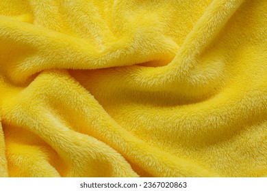 Macro yellow towel background,Terry cloth, yellow towel texture background. Soft fluffy textile bath or beach towel material  - Shutterstock ID 2367020863