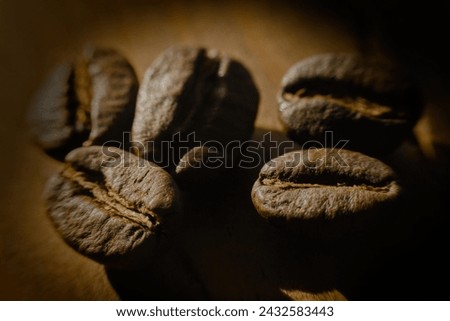 Macroshot of coffeebeans on the table.