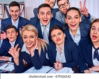 Mad Business People Office In High School Celebrate Successful Passing Exams. Team Student College Rejoice Project. Men And Women Fooled To Give Bunny Fingers Prank. Group Of Graduates Making Selfie.