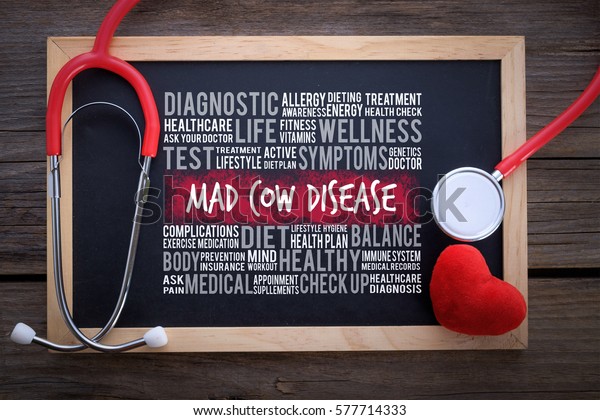 Mad Cow Disease\
general health word cloud on chalkboard with stethoscope, health /\
medical concept.