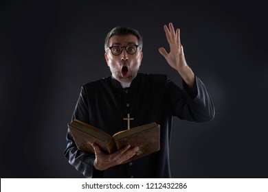 Mad crazy priest surprised expression scared - Shutterstock ID 1212432286