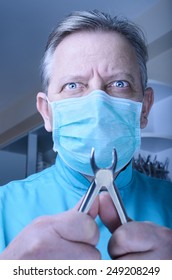 Mad Dentist With Pliers In His Hands