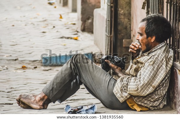 Mad Hungry Beggar Sitting On Road Stock Photo (Edit Now) 1381935560