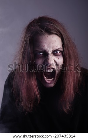 Similar – Angry and aggressive young woman