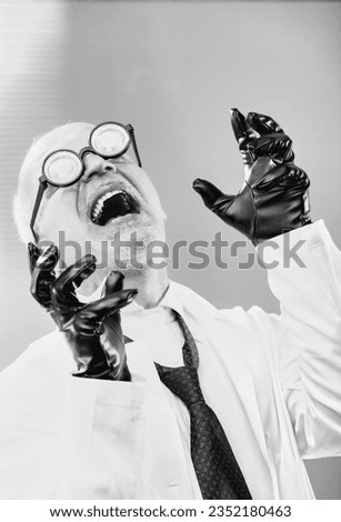 mad scientist, an iconic evil professor in outdated black and white, cackles madly at his wicked plan for world domination. Bald with thick glasses, he wears black leather gloves over his white coat. 