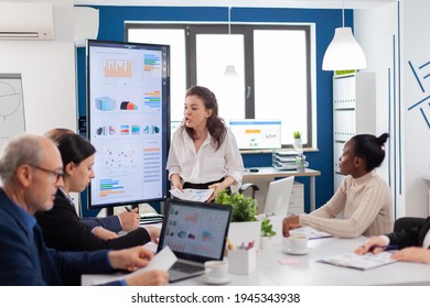 Mad Startup Business Owner Nervous Screaming At Diverse Associates Or Colleagues In Briefingroom. Businesswoman Raging About Multitasking Difficult Job, Screaming In Boardroom