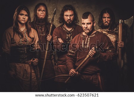 Mad vikings warriors posing in studio.