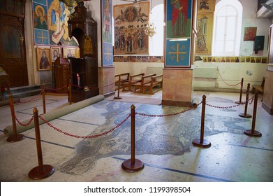 Madaba, Jordan - July 18, 2012: Interior of Greek Orthodox Basilica of St George. with the mosaic map of Holy Land in Madaba, Jordan.