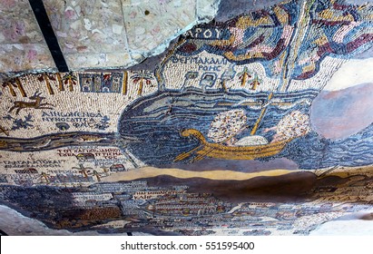 MADABA, JORDAN - NOVEMBER 25, 2016 Ancient 6th Century Map Jordan River Dead Sea Mosaic On Floor Saint George's Greek Orthodox Church Madaba Jordan.  Mosaic Discovered 1884