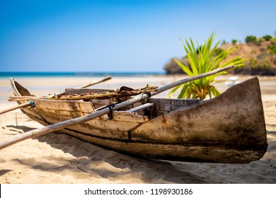 Madagascan Pirogue Boat On The Beach On Nosy Be, Madagascar. Blurred Background.