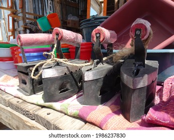 [Madagascar] Charcoal Irons Lined Up In The Market In Toliara