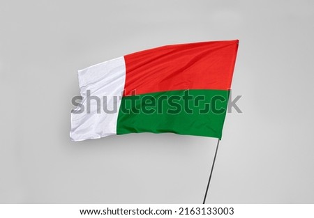 The Madagascar flag is isolated on a white background with a clipping path. flag symbols of Madagascar. flag frame with empty space for your text.
