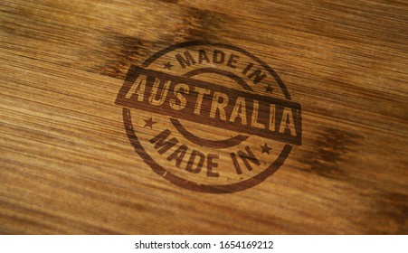 Made In Australia Stamp Printed On Wooden Box. Factory, Manufacturing And Production Country Concept.