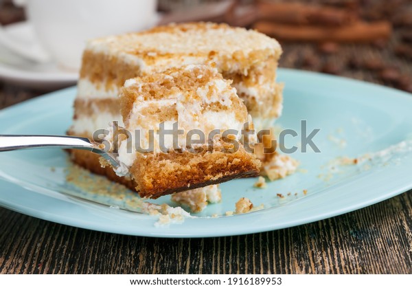 made\
from a large number of ingredients, a piece of cake with a large\
number of calories to eat at the end of lunch, pastry made of cake\
and cream, sweet and delicious multi-layered\
dessert