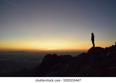 madinah, saudi arabia 10 february 2019 - photo of a silhouette of a man on the top of mount uhud