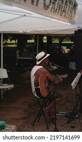 Madison, AL USA - July 2, 2022: Musician At A Local Farmers Market.                               