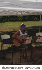 Madison, AL USA - July 2, 2022: Musician At A Local Farmers Market.                               