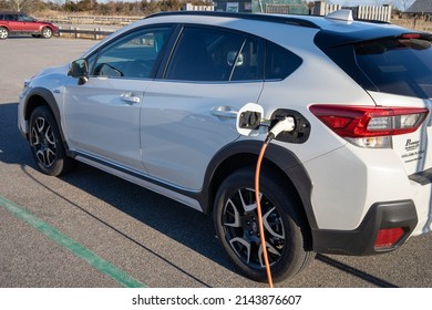 Madison, Connecticut USA - Jan 22, 2022 - A Subaru Electric Car At A Charging Station In .Hammonasset Beach State Park