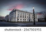 Madison county courthouse in Edwardsville, Illinois during early morning hours with street lights still on.