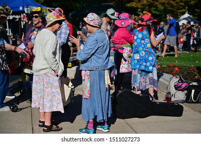 Madison, WI / USA - September 7, 2019: Members Of The Raging Grannies, An International Social Justice Group, Gather At The Dane County Farmer's Market On The Capitol Square.