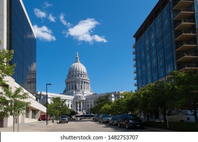 Madison, Wisconsin - 8 August 2019: Two Office Buildings On Either Side Of The Street Near The Wisconsin Capitol