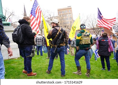 Madison, Wisconsin / USA - April 24th, 2020: Pro 2nd Amendment gun right owners participated at Reopen Wisconsin rally protesting the safer at home order given by Tony Evers.