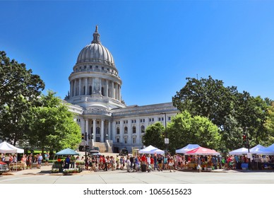 MADISON, WISCONSIN, USA - JULY 29, 2017. People Enjoying Visiting Dane County Madison FarmersÃ? Market On The Square, The Most Popular Market In The State.