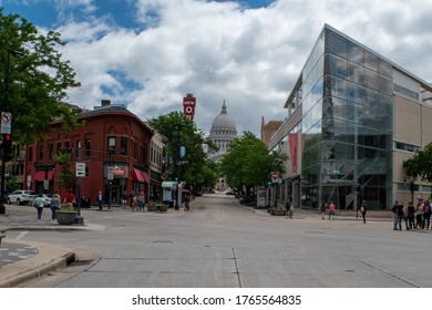 Madison, Wisconsin / USA - June 2017: Busy Morning In Downtown Madison Wisconsin.People Walking Capital Building In The Background.