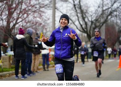 Madison, Wisconsin / USA - November 10th, 2019: Many runners and joggers throughout Wisconsin and the neighboring states came out to MADISON MARATHON PRESENTED BY SSM HEALTH.  - Shutterstock ID 1556884880