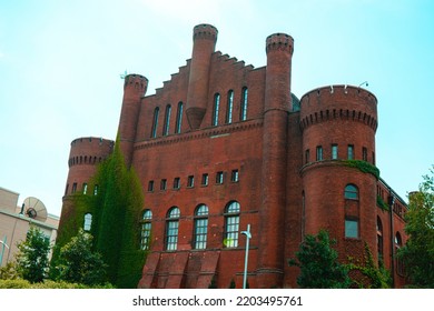 Madison, Wisconsin \ USA - September 10th 2022: The Red Gym At The University Of Wisconsin Madison With A Blue Sky And Ivy Growing Up The Side.