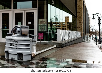 Madison, Wisconsin/USA March 2020 Covid-19 Outbreak. Downtown Madison During The 2020 Outbreak. Illustrative Editorial Of Hand Cleaning Station Outside Of Downtown Madison Library.