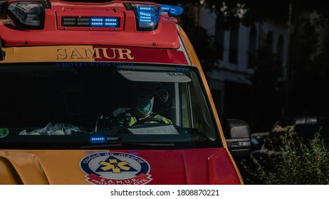 Madrid, España. 22 May 2020. Ambulance Driver With Mask And Protective Equipment Attends An Incident During The Coronavirus Pandemic