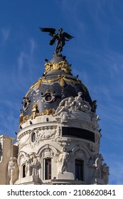 Madrid Building In Alcalá Street With Metropolis Sign And Mythological Being On The Roof