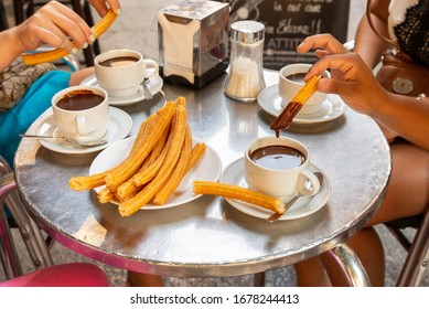 MADRID - JUNE 28, 2013: Churros and hot chocolate at the Chocolateria San Gines