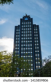 MADRID - MAY 5, 2019: Low-angle View Of The Headquarters Of The Spanish Insurance Company Mutua Madrileña At The Paseo De La Castellana In Madrid, With The Blue Logo Of The Company To Be Recognised.