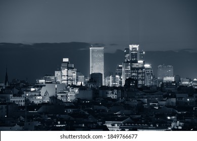 Madrid Rooftop View Of The City Skyline With Business District Skyscrapers At Night In Spain.