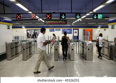 MADRID - SEPTEMBER 3: Metro station entrance turnstiles on September 3, 2009 in Madrid. Madrid Metro is among seven longest metro systems in the world.