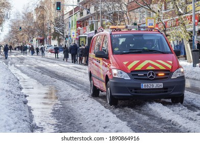 Madrid (Spain); 01 10 2021: The Effect Of Heavy Storm Filomena: Snow, Chaos And Streets Cut Off In The Middle Of Covid-19 Pandemic. Fire Truck Over The Snow Road